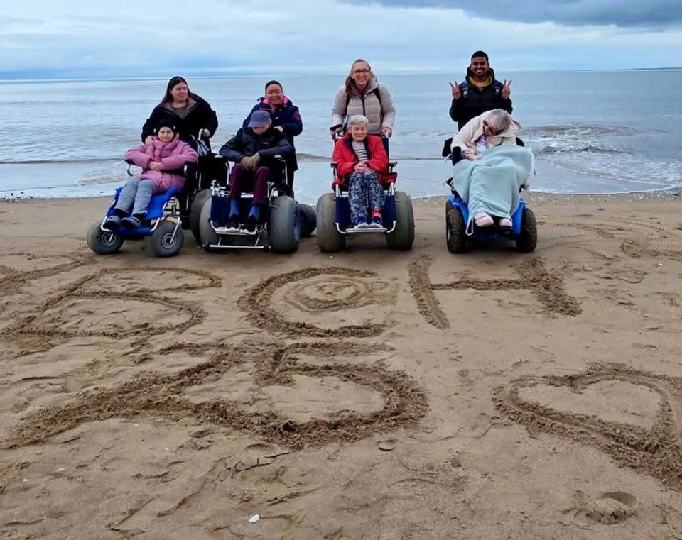 Broxburn Care Home residents enjoying a day out at the beach